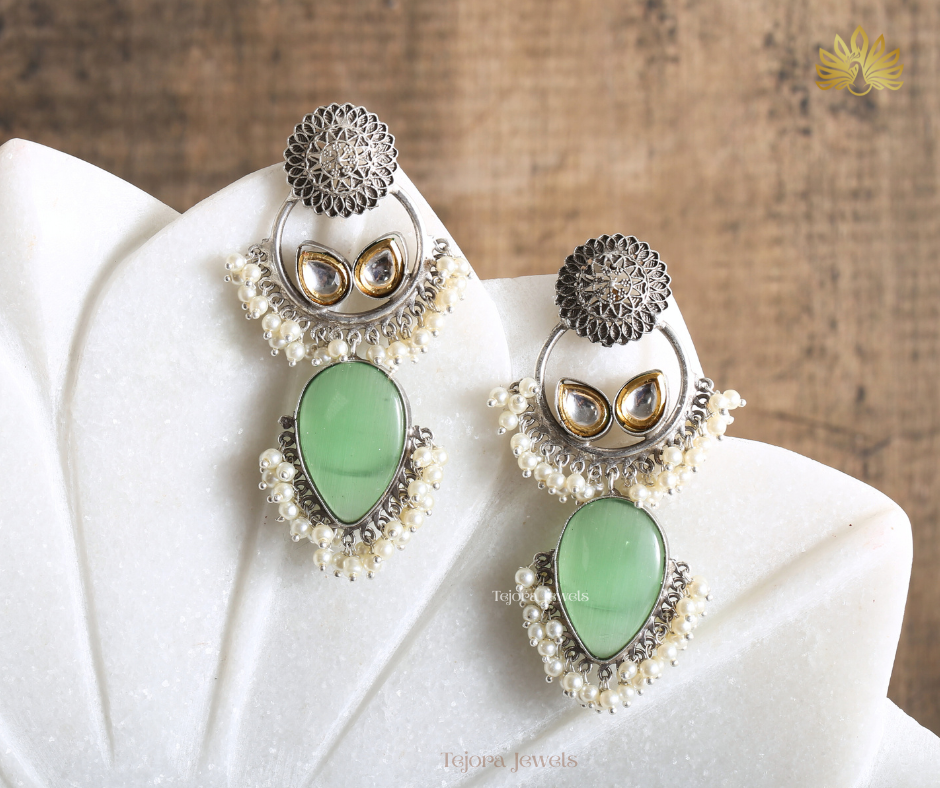 Arya Oxidized Silver Jhumkas Earrings with Teardrop Stone and Pearl Clusters