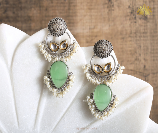 Arya Oxidized Silver Jhumkas Earrings with Teardrop Stone and Pearl Clusters